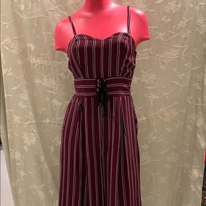 Striped maroon jumper.